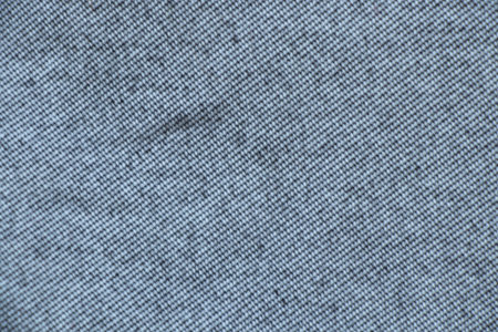 dark gray fabric background as backgroundの写真素材