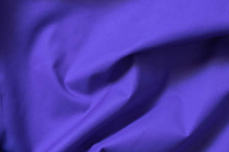 purple jacket fabric as background close upの写真素材