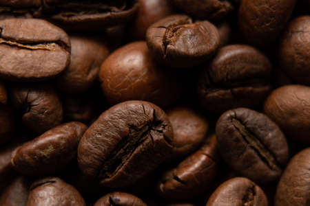 roasted whole coffee beans as background, macro photoの写真素材