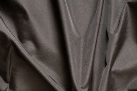 black crumpled background of matter close-upの写真素材