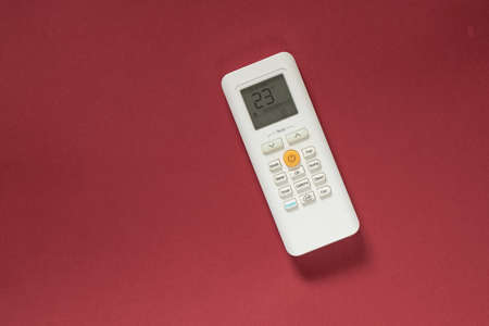 white remote control from air conditioner on isolated background close upの写真素材