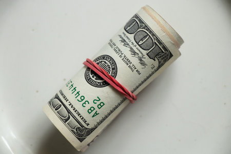 roll with american dollars on isolated background close up, finance