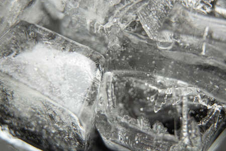 ice cubes on black background macro photo