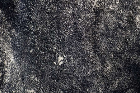 dark cloth in flour as background close upの写真素材