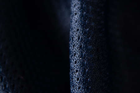 dark blue fabric wrinkled as background close-upの写真素材