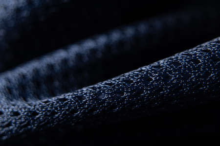 dark blue fabric wrinkled as background close-up