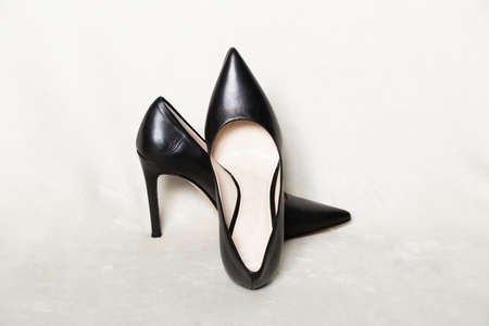 black womens high-heeled shoes on a white background, womens shoes