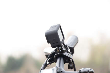 Ukraine Dnipro 20.04.201 - GoPro HERO 9 Black on a bicycle in the forest in spring, shooting on an...