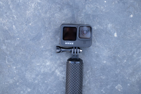 Ukraine Dnepr 04/21/2021 - GoPro Hero 9 Black lies on the black floor in the sun on the streetのeditorial素材