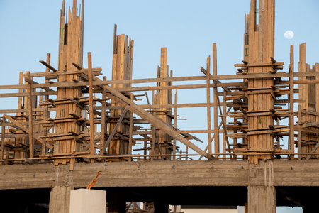 construction of a new hotel in the desert on a background of blue sky, construction of a building