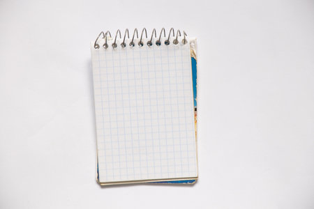 old blank squared notebook on paper close upの写真素材