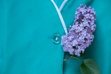 an old nurse's suit lies on a wooden table, the uniform of a medical worker in Ukraine, a doctor's...