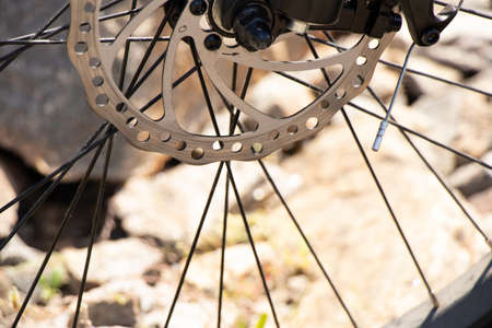Ukraine Dnepr 08.05 .2021 - a new red electric bike stands on a stone granite quarry, new...