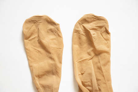 womens nylon beige tights close up on an isolated background