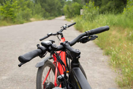 Ukraine Dnipro 27.06.2021 - electric bike in the park during the day for a walk, city electric transport, environmentally friendly transportのeditorial素材