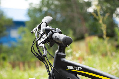 Ukraine Dnipro 27.06.2021 - electric bike in the park during the day for a walk, city electric transport, environmentally friendly transportのeditorial素材