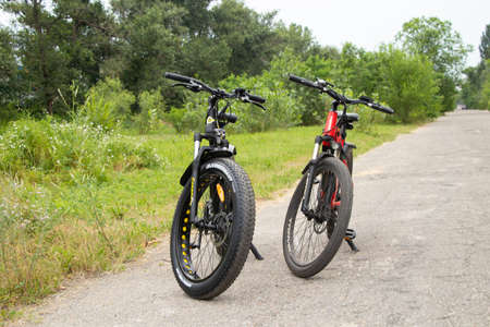 Ukraine Dnipro 27.06.2021 - electric bike in the park during the day for a walk, city electric transport, environmentally friendly transportのeditorial素材
