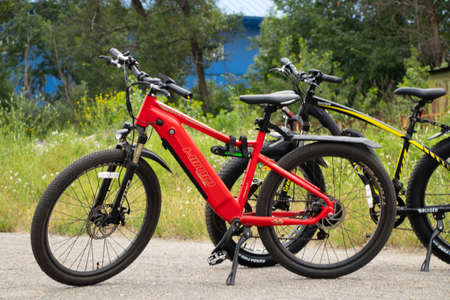 Ukraine Dnipro 27.06.2021 - electric bike in the park during the day for a walk, city electric transport, environmentally friendly transportのeditorial素材