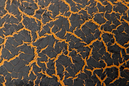 brown paint with cracked effect as background close-up, brown paintの写真素材