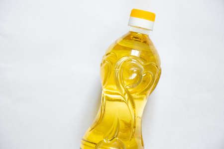 refined olia in a plastic bottle on a white background, sunflower oliaの写真素材
