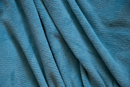 wrinkled soft light-colored fabric as a background, blue plaid for the backgroundの写真素材
