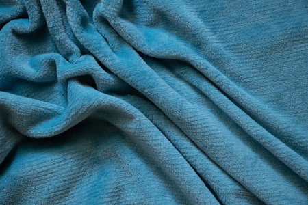 wrinkled soft light-colored fabric as a background, blue plaid for the backgroundの写真素材