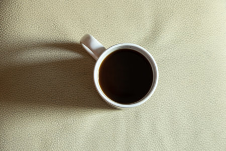 a cup of coffee for breakfast on a light background, a cup of coffee on the table, coffeeの写真素材