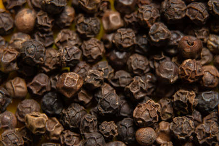 black dry peas as background, macro photo, spices