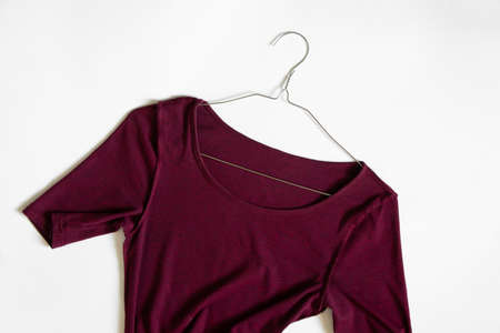 women's red dress lies on a white background, red dressの写真素材
