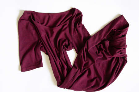 women's red dress lies on a white background, red dressの写真素材
