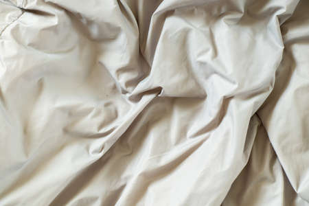 wrinkled white fabric as background, white backgroundの写真素材