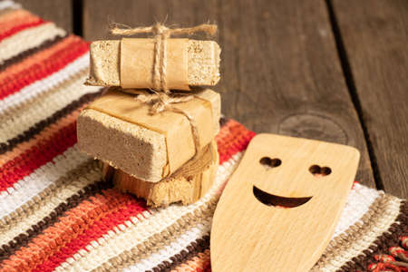 a piece of peanut halva on the table for breakfast, halva on the tableの写真素材