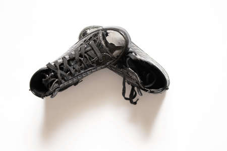 black patent women's shoes torn lies on a white isolated background, women's shoesの写真素材