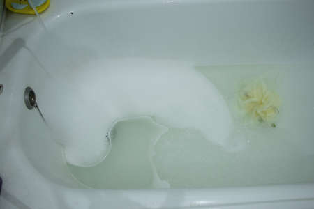 an old bathroom in a Soviet apartment without renovation, a bathroom with old renovations, a bathroomの写真素材