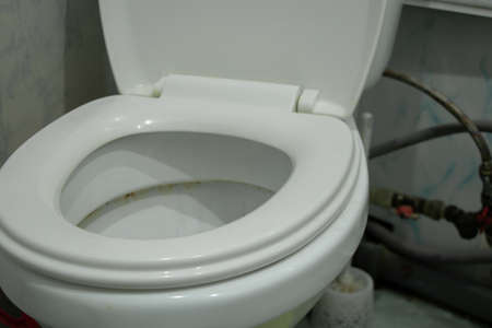 dirty white toilet bowl in the bathroom close-up, bathroom, toiletの写真素材