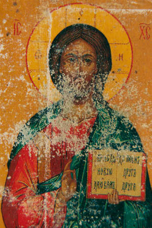 Ukraine Dnipro 08/22/2021 - icon of Jesus Christ and the Guardian Angel, close-up of the prayer book, Christian icon, church religion, godのeditorial素材