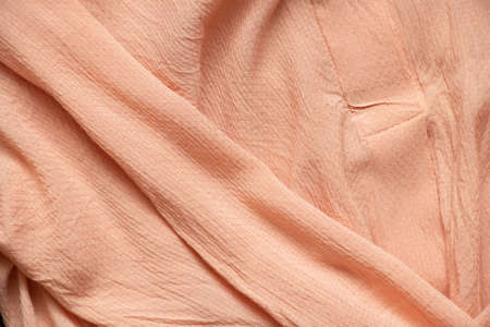 silk viscose blouse wrinkled for the background, women's clothing, silk fabric as a backgroundの写真素材