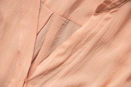 silk viscose blouse wrinkled for the background, women's clothing, silk fabric as a backgroundの写真素材