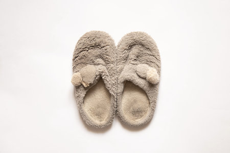 soft gray and dirty indoor slippers on a white background, indoor indoor shoes, gray slippersの写真素材