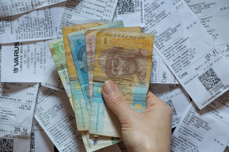 Ukraine Dnipro 11/18/2021 - checks from the grocery supermarket Varus and hryvnia, checks for...