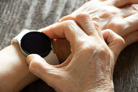 Ukraine Dnipro 11/30/2021 - Smart watch Samsung Galaxy Watch 4.40 mm on a woman's hand, new watch, smart watch, watch on her handのeditorial素材