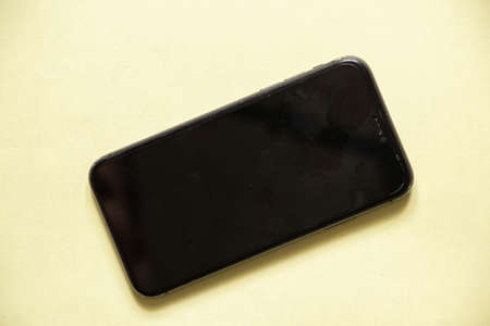 Ukraine Dnipro 11/30/2021 - Smartphone Apple iPhone 11 on an isolated background, old phoneのeditorial素材