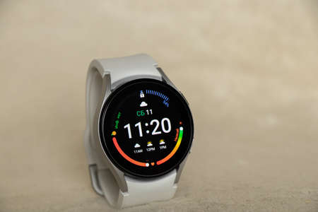 Ukraine Dnepr 11.12.2021 - Smart watch Samsung Galaxy Watch 4 track with a gray strap on an isolated...