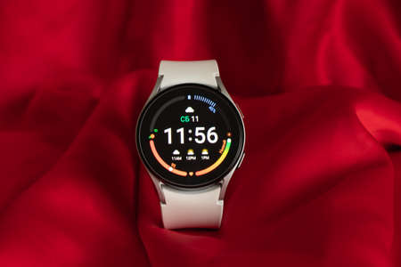 Ukraine Dnepr 11.12.2021 - Smart watch Samsung Galaxy Watch 4 track with a gray strap on an isolated...
