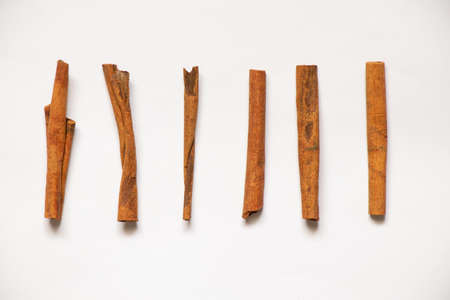 cinnamon lies on a white background, cinnamon close-up