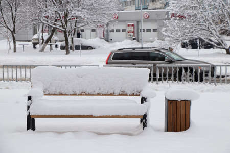 Ukraine Dnipro 26.12.2021 - City in winter with cars in the snow and people trying to get to the robot in the morning after snowfall, winter in the cityのeditorial素材