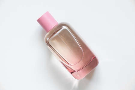 bottle with women's perfume on a white background, perfumed waterの写真素材