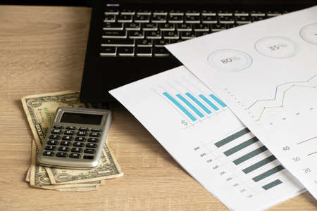 reports and histograms on paper on the table, analytics and statistics on paper, business analyticsの写真素材