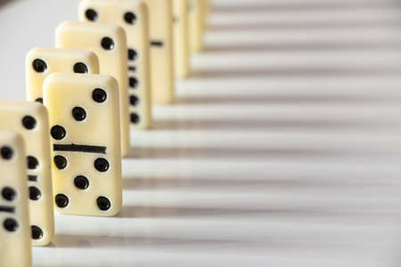 dominoes on a white background close-up, domino effectの写真素材
