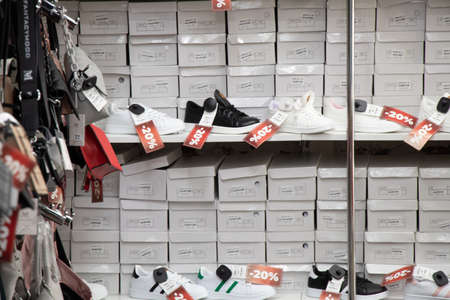 Ukraine Dnepr 18.02.2022 - a store selling inexpensive shoes and bags from China, a shoe and accessories storeのeditorial素材